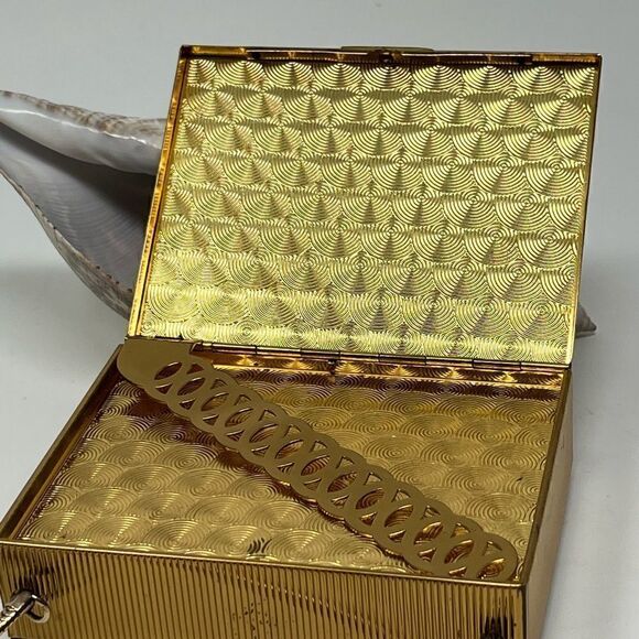 Vintage, gold tone compact/purse.  
